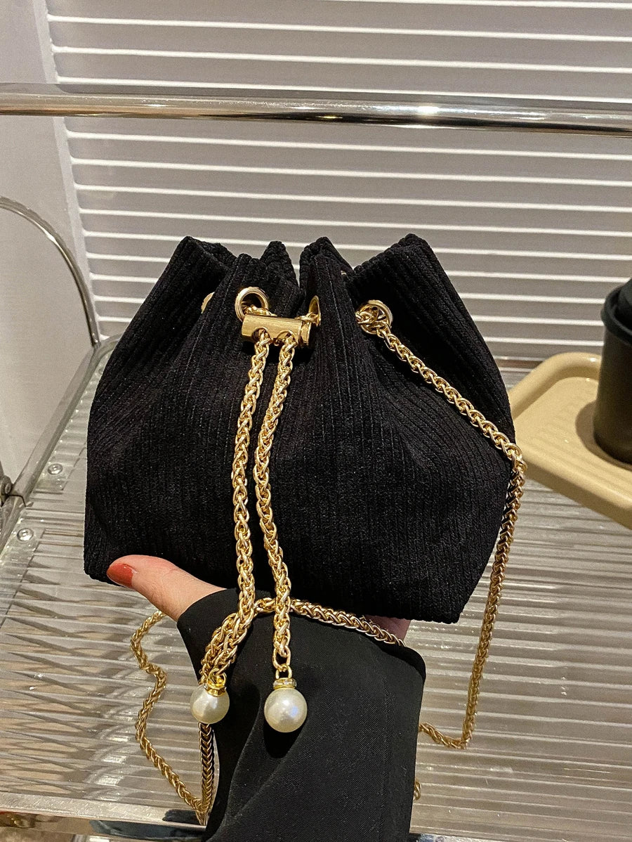 Moderna mini torba  jednobojna sa lanac kaišem