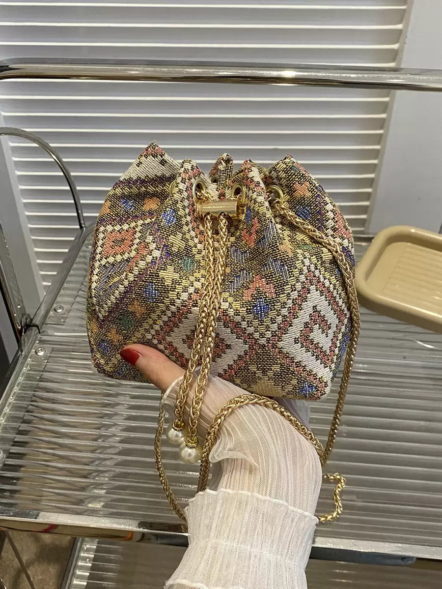 Moderna mini torba  jednobojna sa lanac kaišem