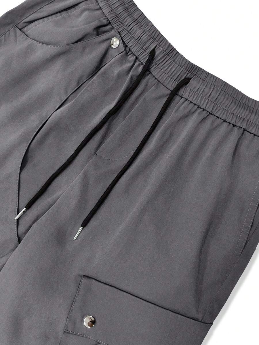 Muške cargo pantalone sa perticom u struku