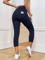 Essnce Ležerne uske kapri pantalone sa zadnjim džepovima