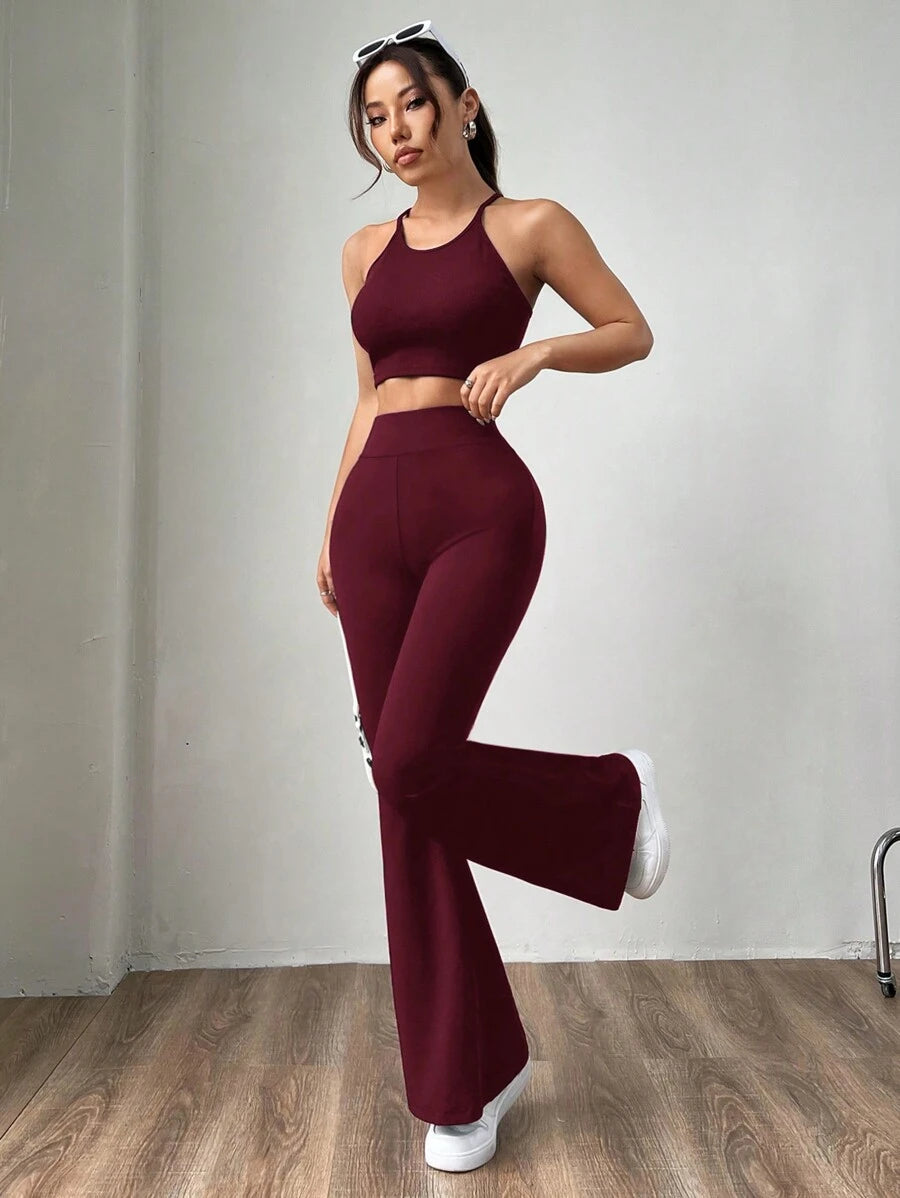 Ženske uske pantalone sa raširenim nogavicama