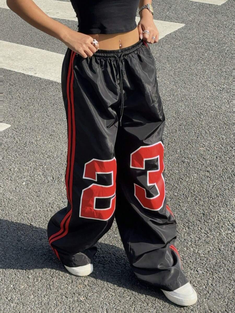 Pantalone širokih nogavica sa roze printom mašne
