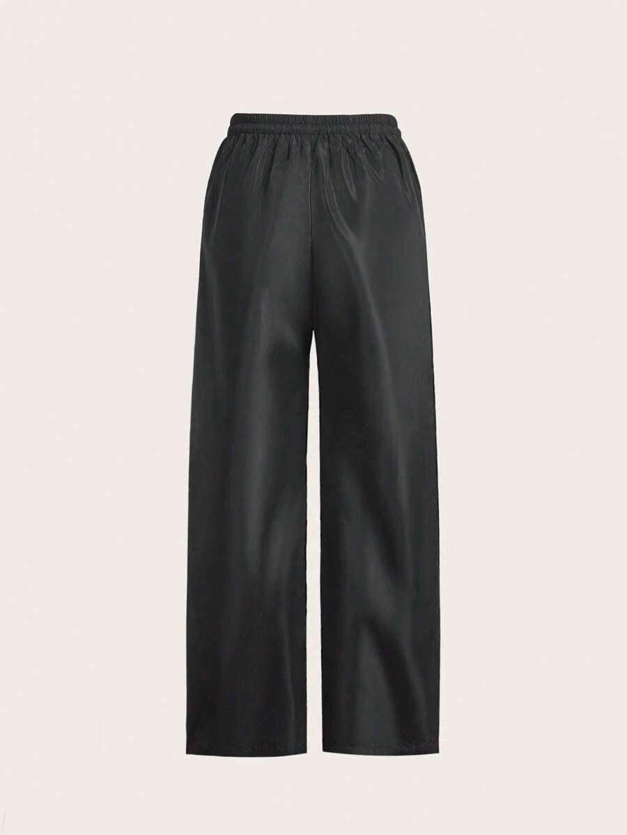Pantalone širokih nogavica sa roze printom mašne