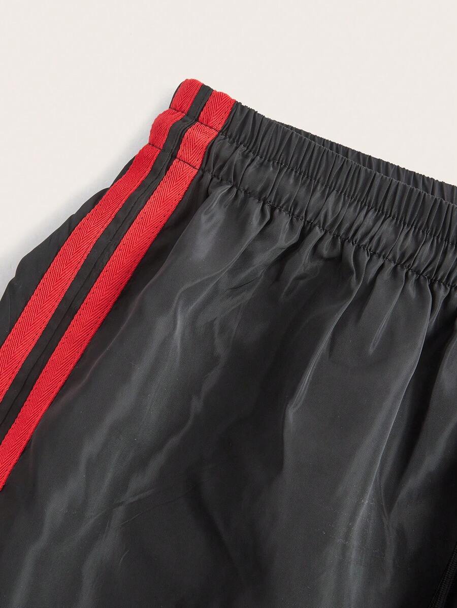 Pantalone širokih nogavica sa roze printom mašne