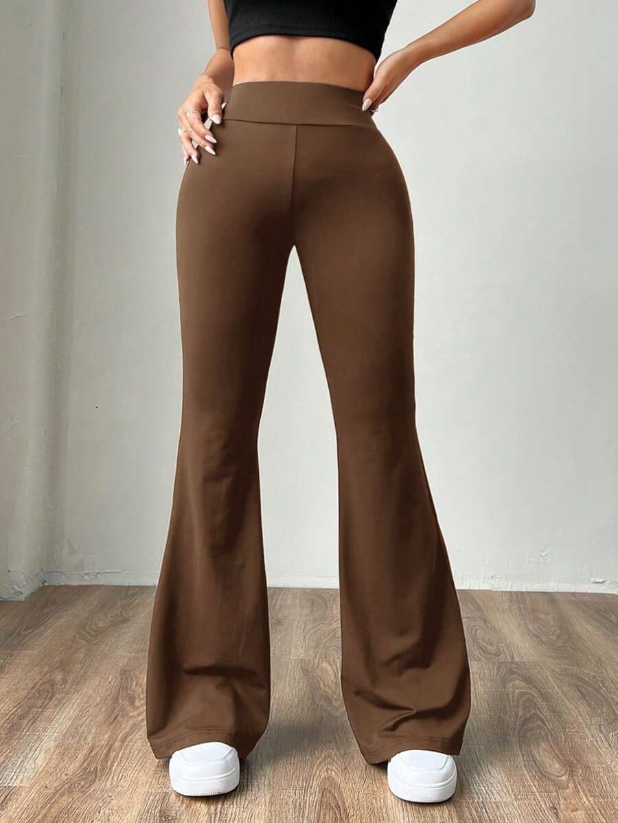 Ženske uske pantalone sa raširenim nogavicama