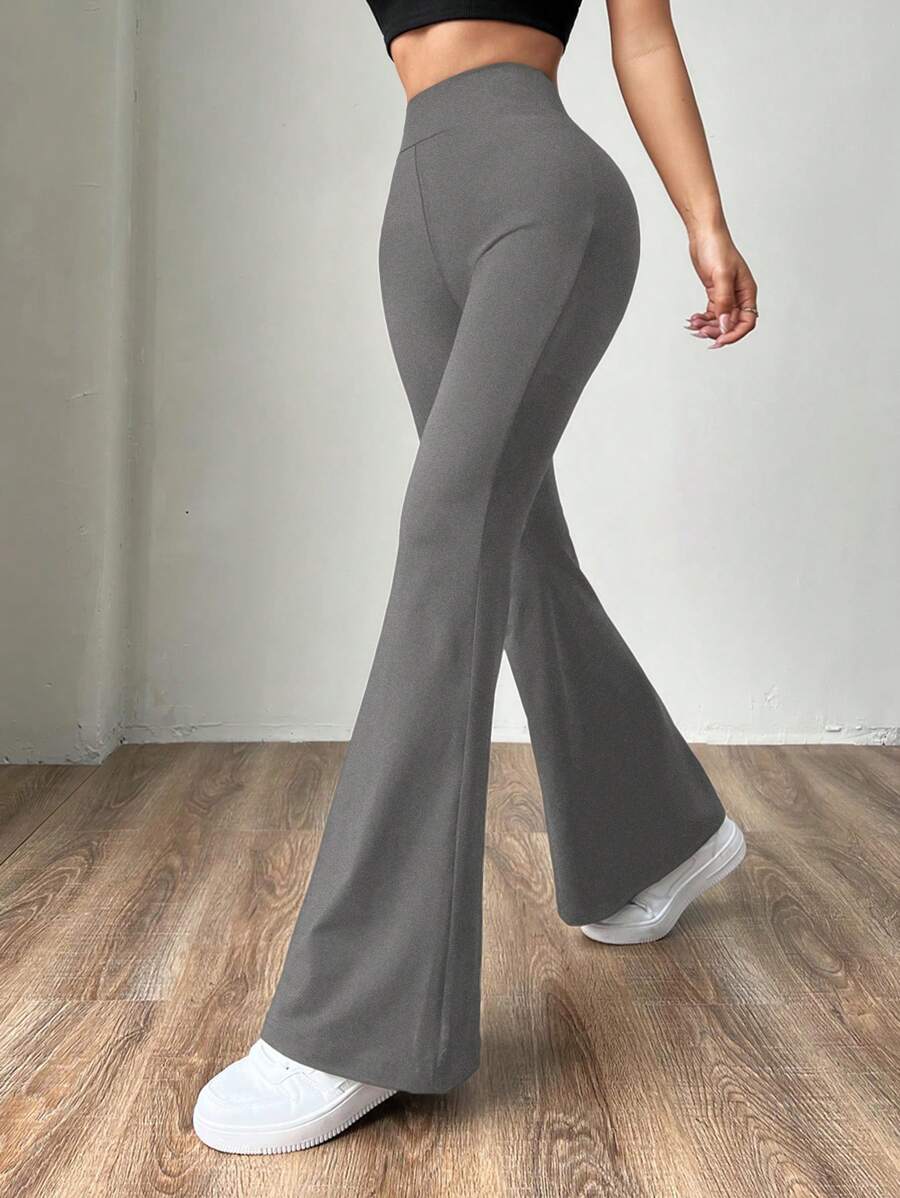 Ženske uske pantalone sa raširenim nogavicama