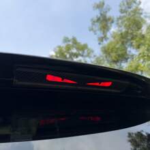 1pc Car High Brake Light Decorative Sticker, Carbon Fiber Tail Light Sticker, Rear Taillight Modification Cartoon Cute Demon Eye Projector Sticker, Light Transmittance Film