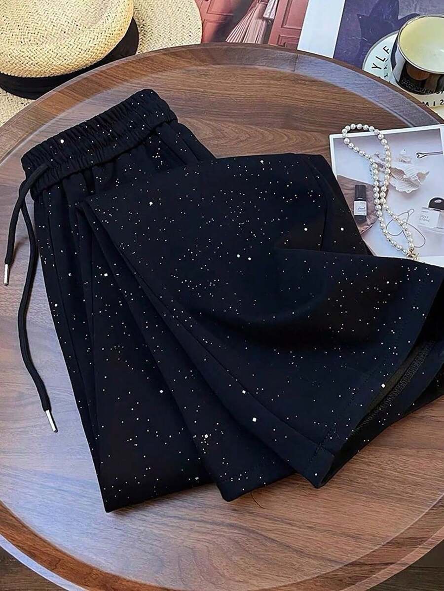 Ležerne široke pantalone ravnih nogavica sa elastičnim strukom, dezen zvezdanog neba