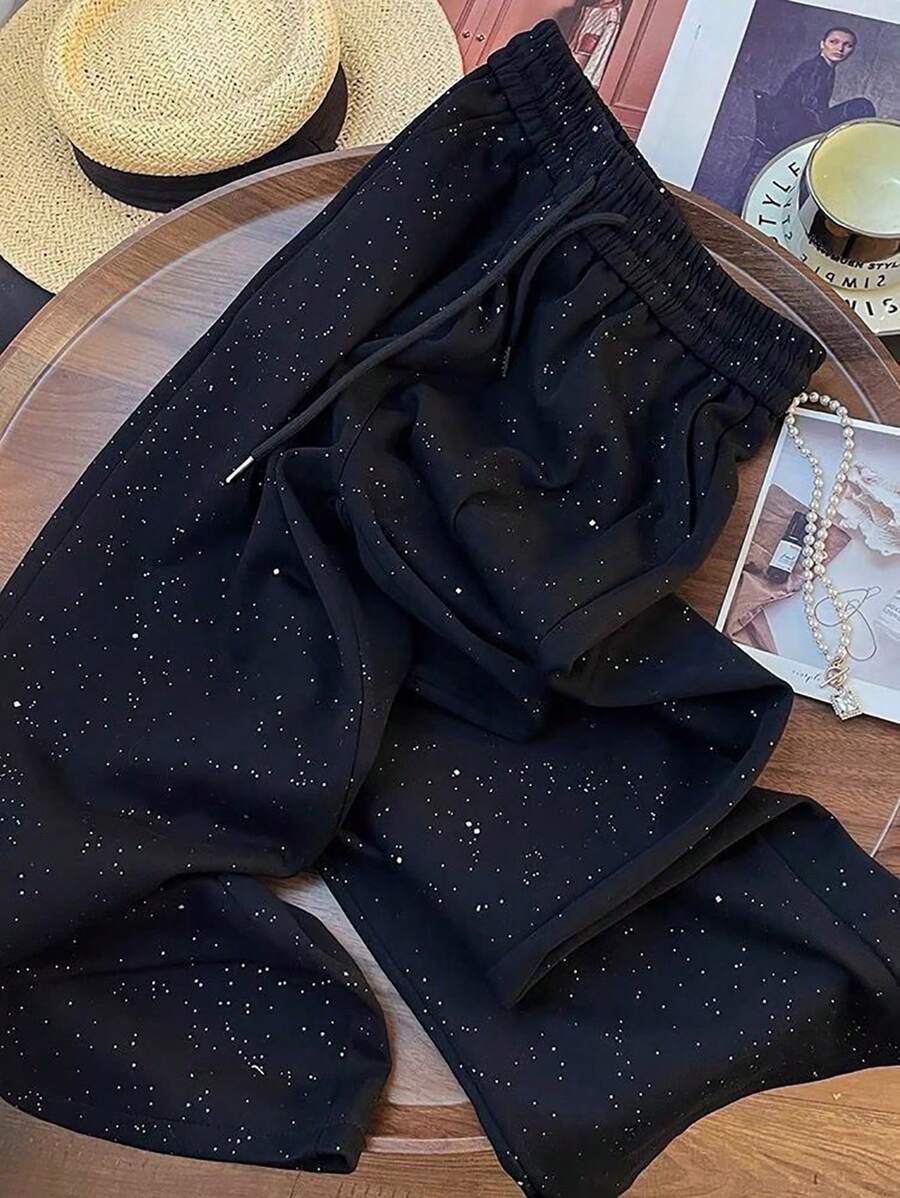 Ležerne široke pantalone ravnih nogavica sa elastičnim strukom, dezen zvezdanog neba