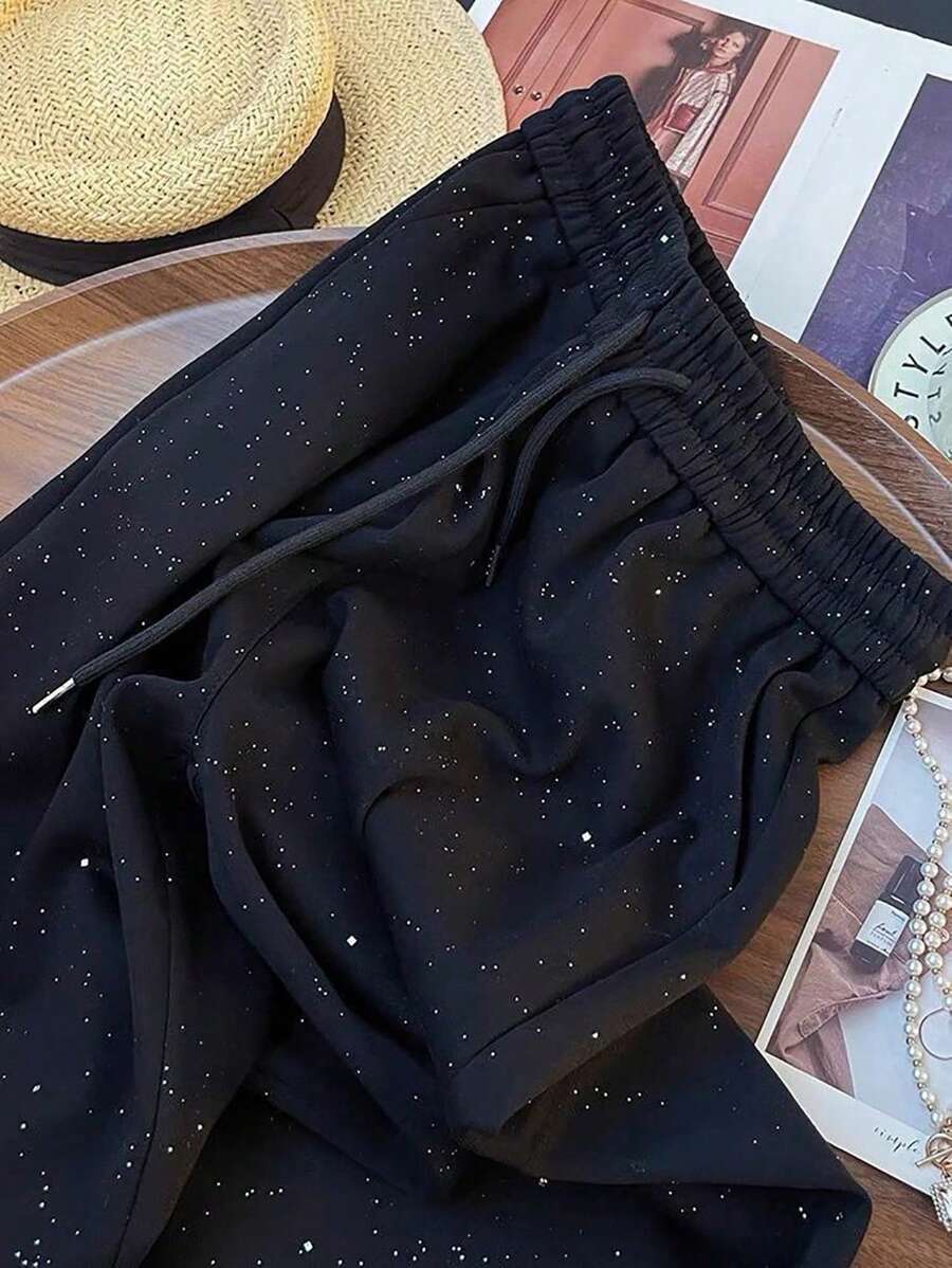 Ležerne široke pantalone ravnih nogavica sa elastičnim strukom, dezen zvezdanog neba