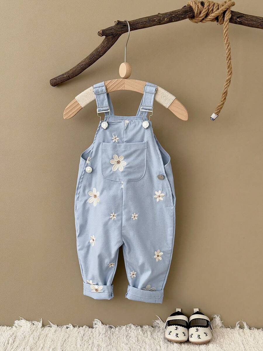 Ležerne svetloplave pantalone za bebe devojčice sa vezom sitnih cvetova