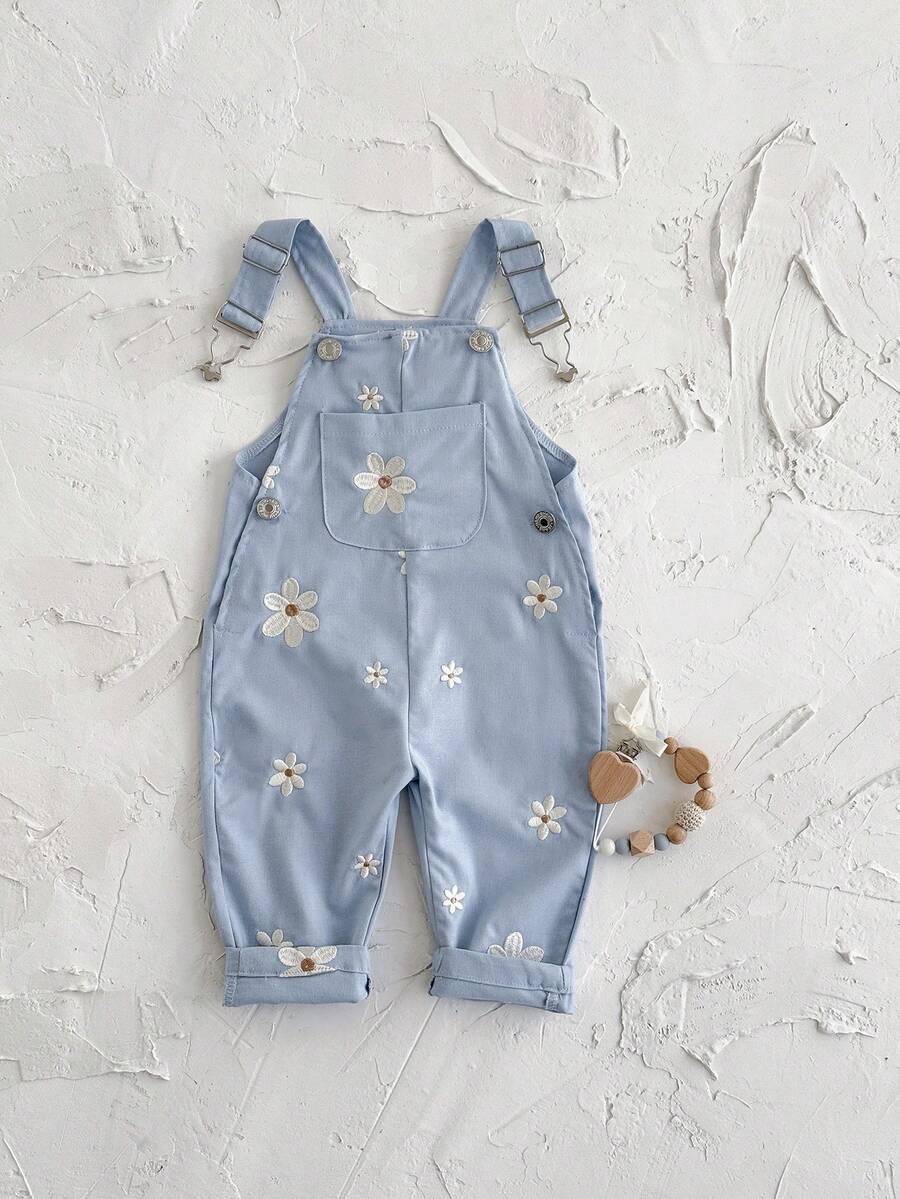 Ležerne svetloplave pantalone za bebe devojčice sa vezom sitnih cvetova