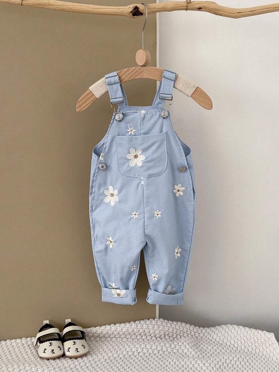 Ležerne svetloplave pantalone za bebe devojčice sa vezom sitnih cvetova