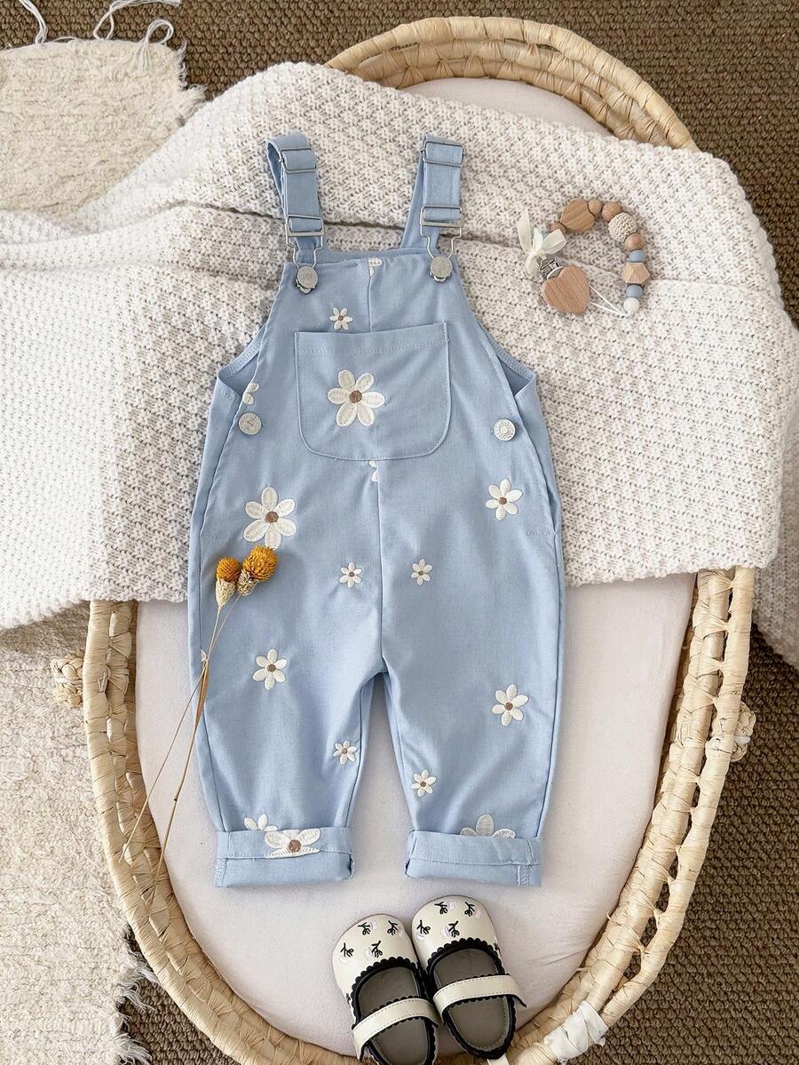 Ležerne svetloplave pantalone za bebe devojčice sa vezom sitnih cvetova