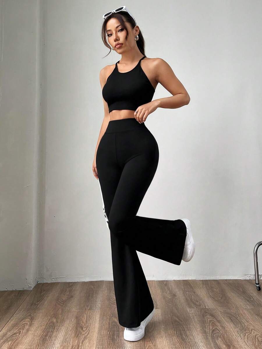 Ženske uske pantalone sa raširenim nogavicama