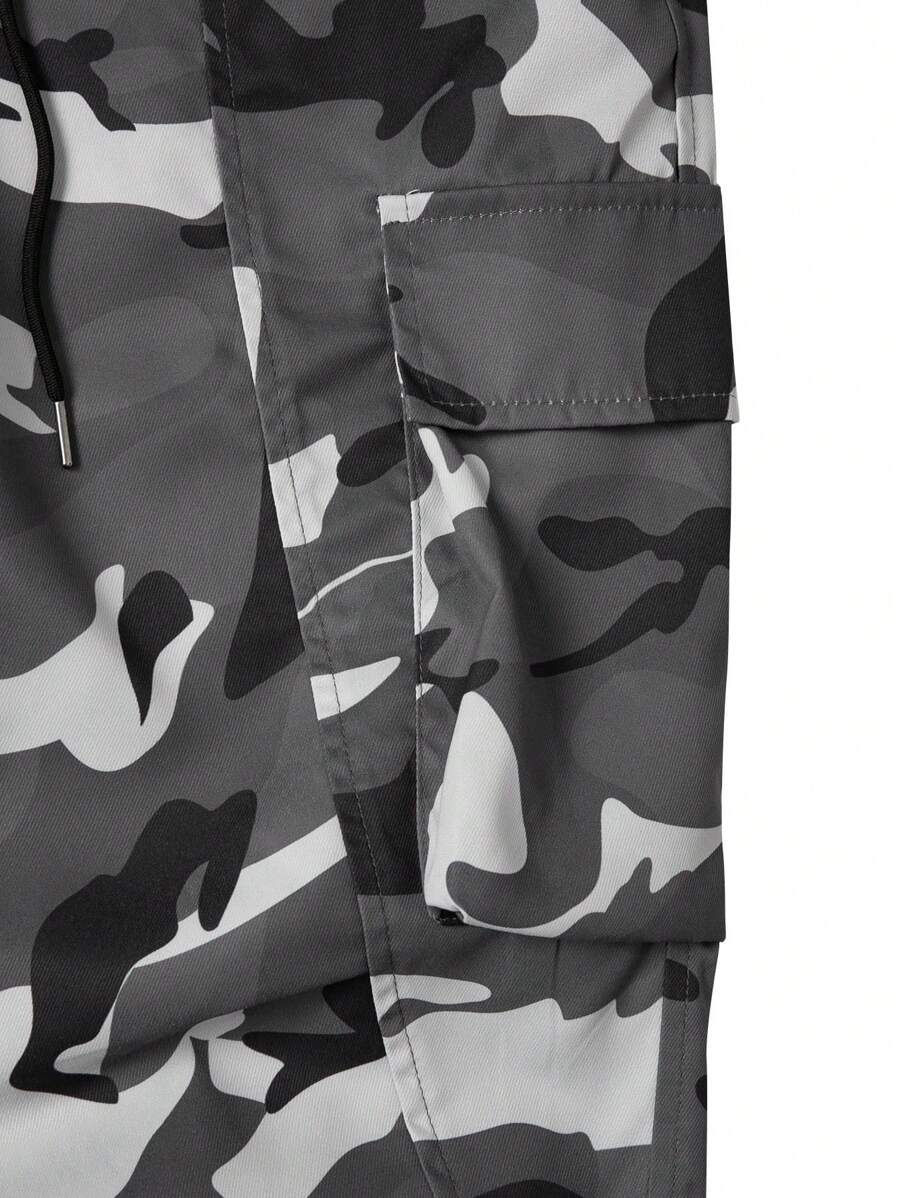 Muške široke cargo pantalone jednobojne sa pertlom u struku i džepovima
