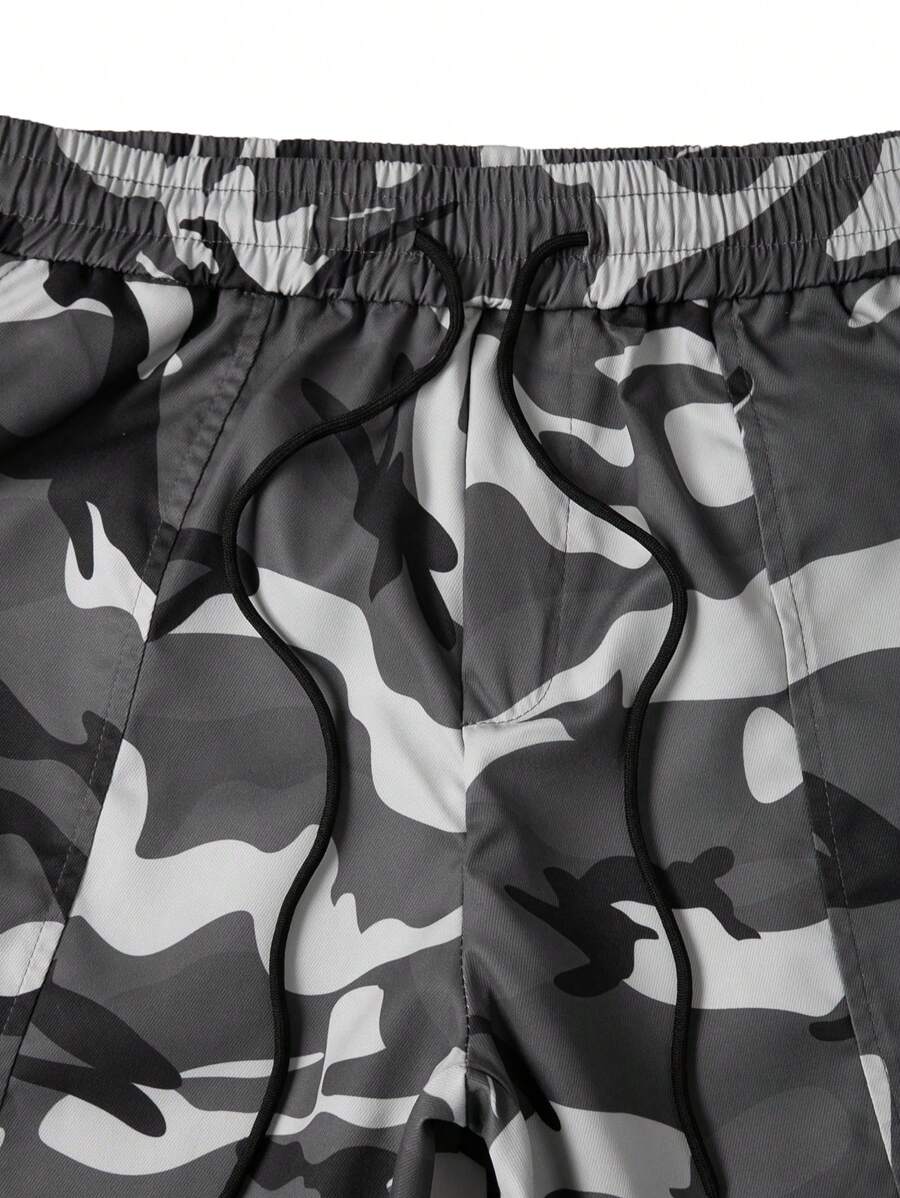 Muške široke cargo pantalone jednobojne sa pertlom u struku i džepovima