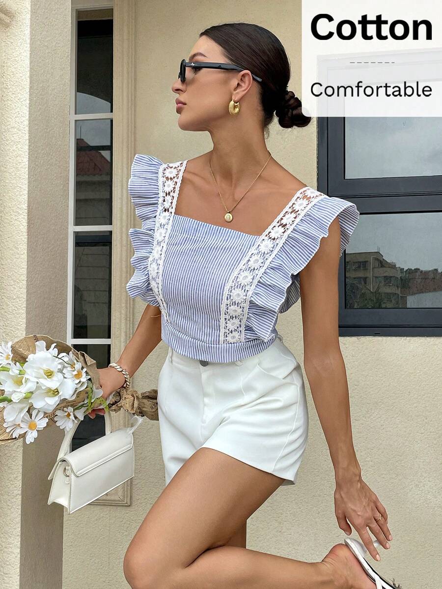 Ženska elegantna crno‑bela bluzica sa čipkastim umetkom
