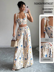 Komplet top bez leđa  + široke pantalone sa vezicom u struku