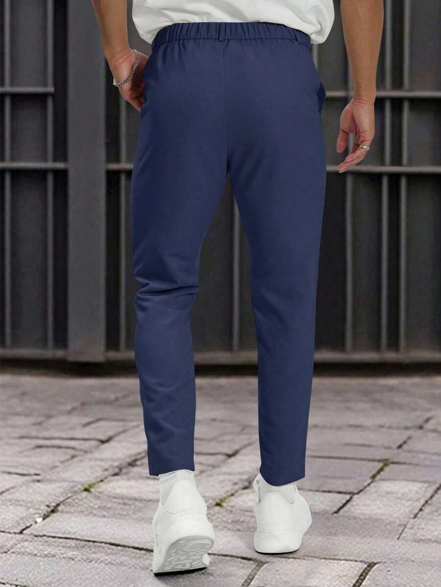 Muške formalne pantalone jednobojne sa kosim džepovima, bez kaiša
