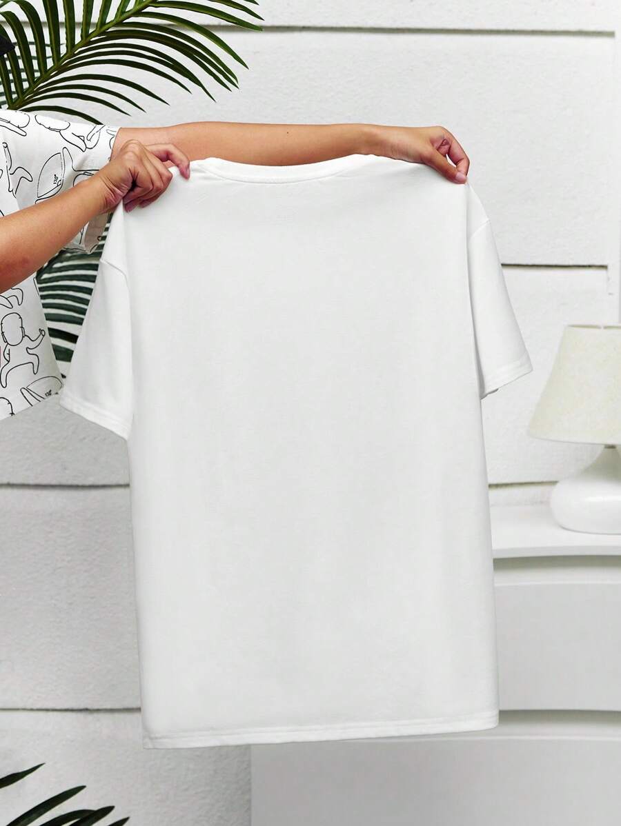 žŽenska majica plus size sa cvetnim i slovnim printom, okruglim izrezom i kratkim rukavima