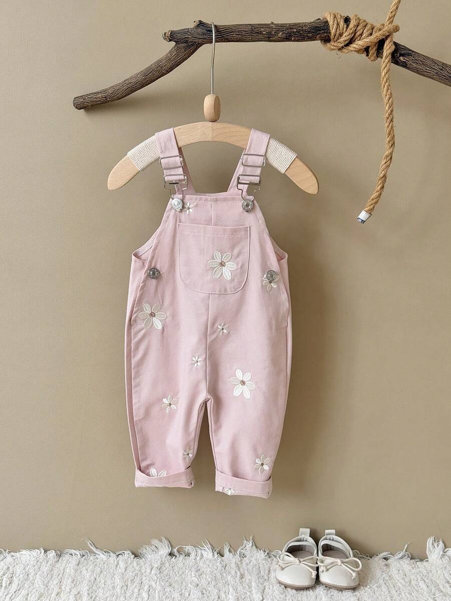 Ležerne svetloplave pantalone za bebe devojčice sa vezom sitnih cvetova