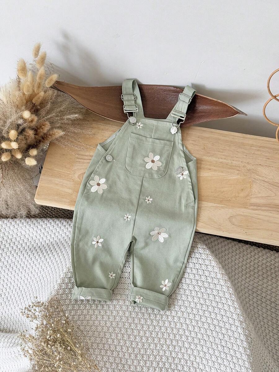Ležerne svetloplave pantalone za bebe devojčice sa vezom sitnih cvetova