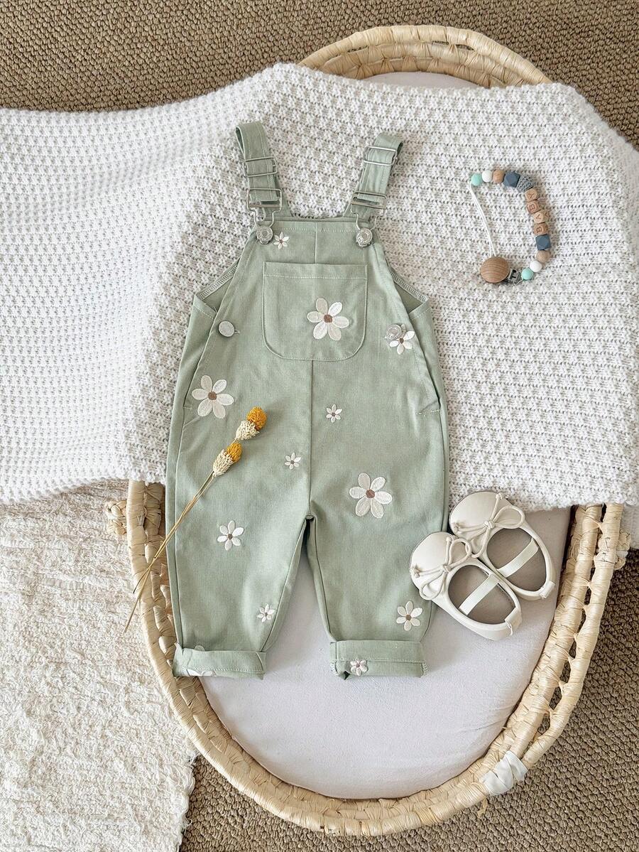Ležerne svetloplave pantalone za bebe devojčice sa vezom sitnih cvetova