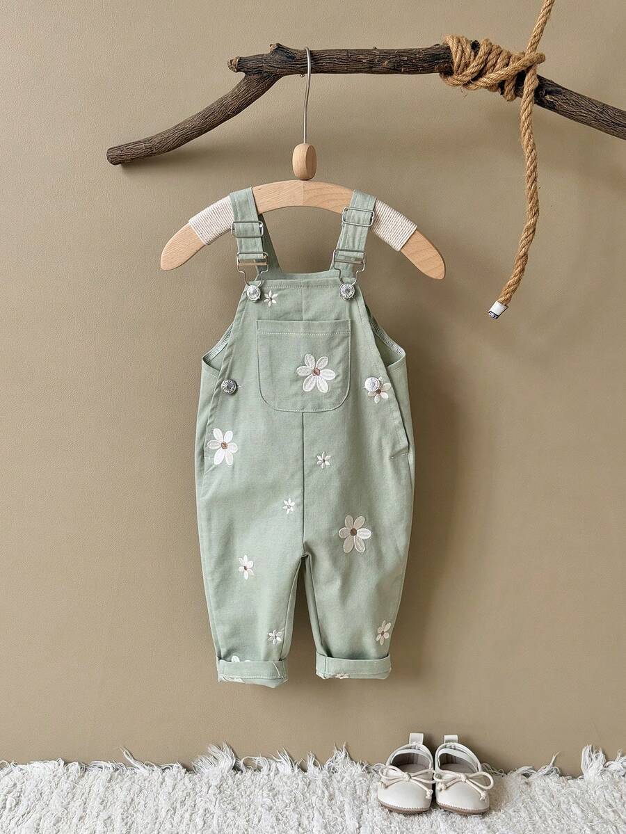 Ležerne svetloplave pantalone za bebe devojčice sa vezom sitnih cvetova