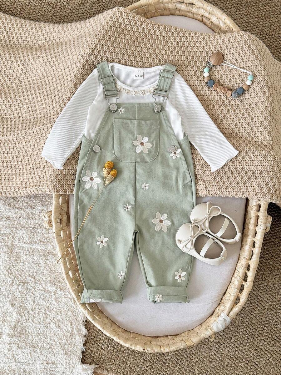 Ležerne svetloplave pantalone za bebe devojčice sa vezom sitnih cvetova