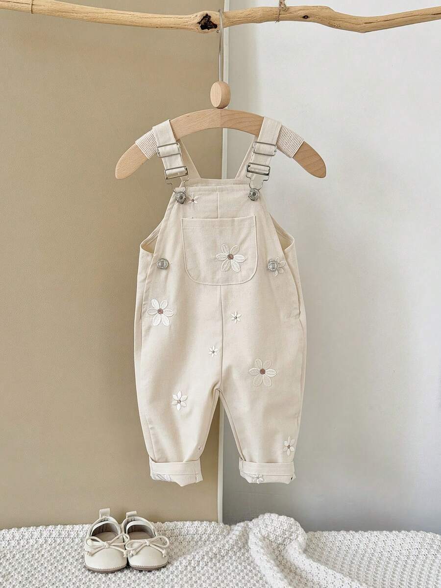 Ležerne svetloplave pantalone za bebe devojčice sa vezom sitnih cvetova