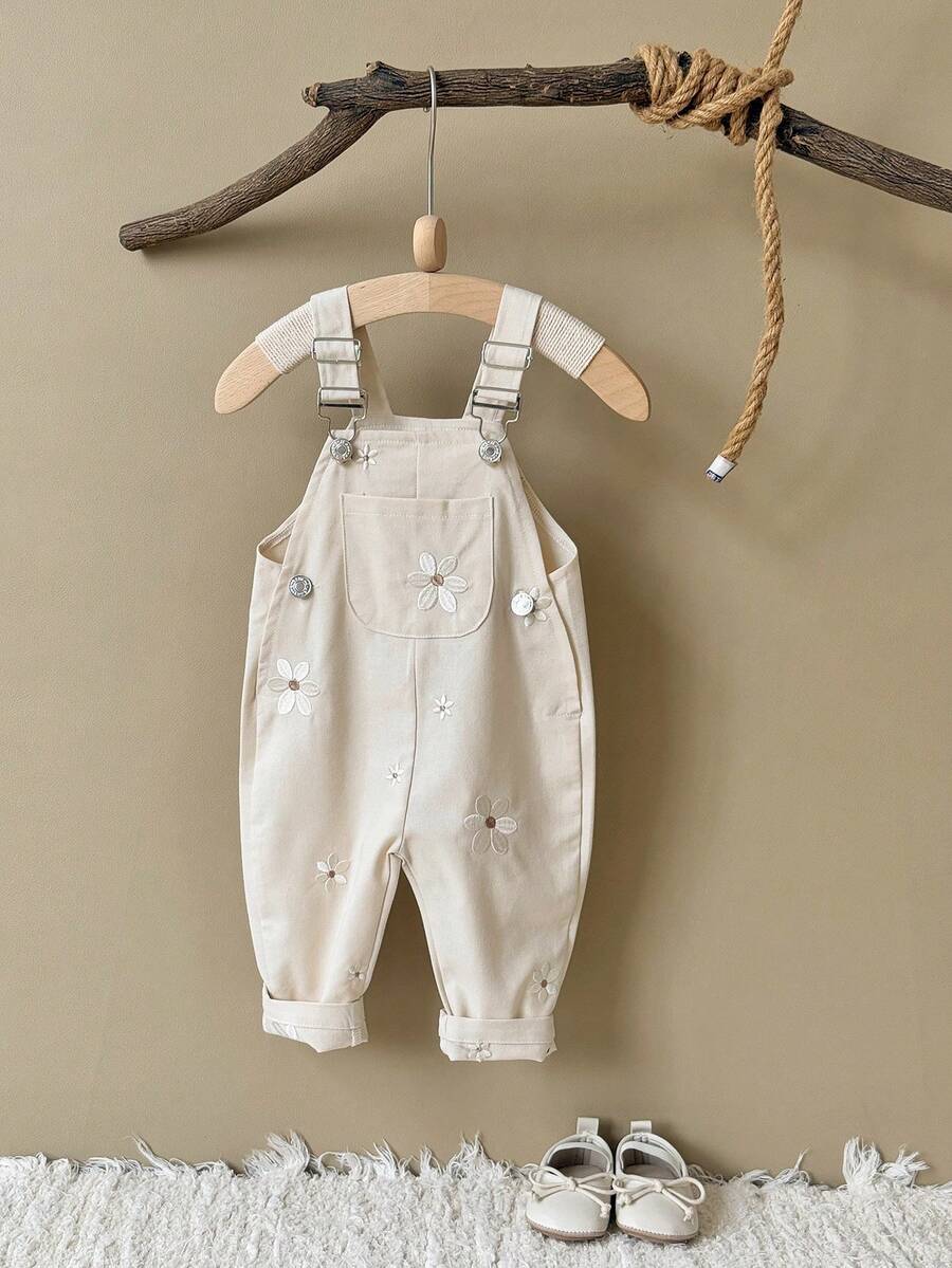 Ležerne svetloplave pantalone za bebe devojčice sa vezom sitnih cvetova