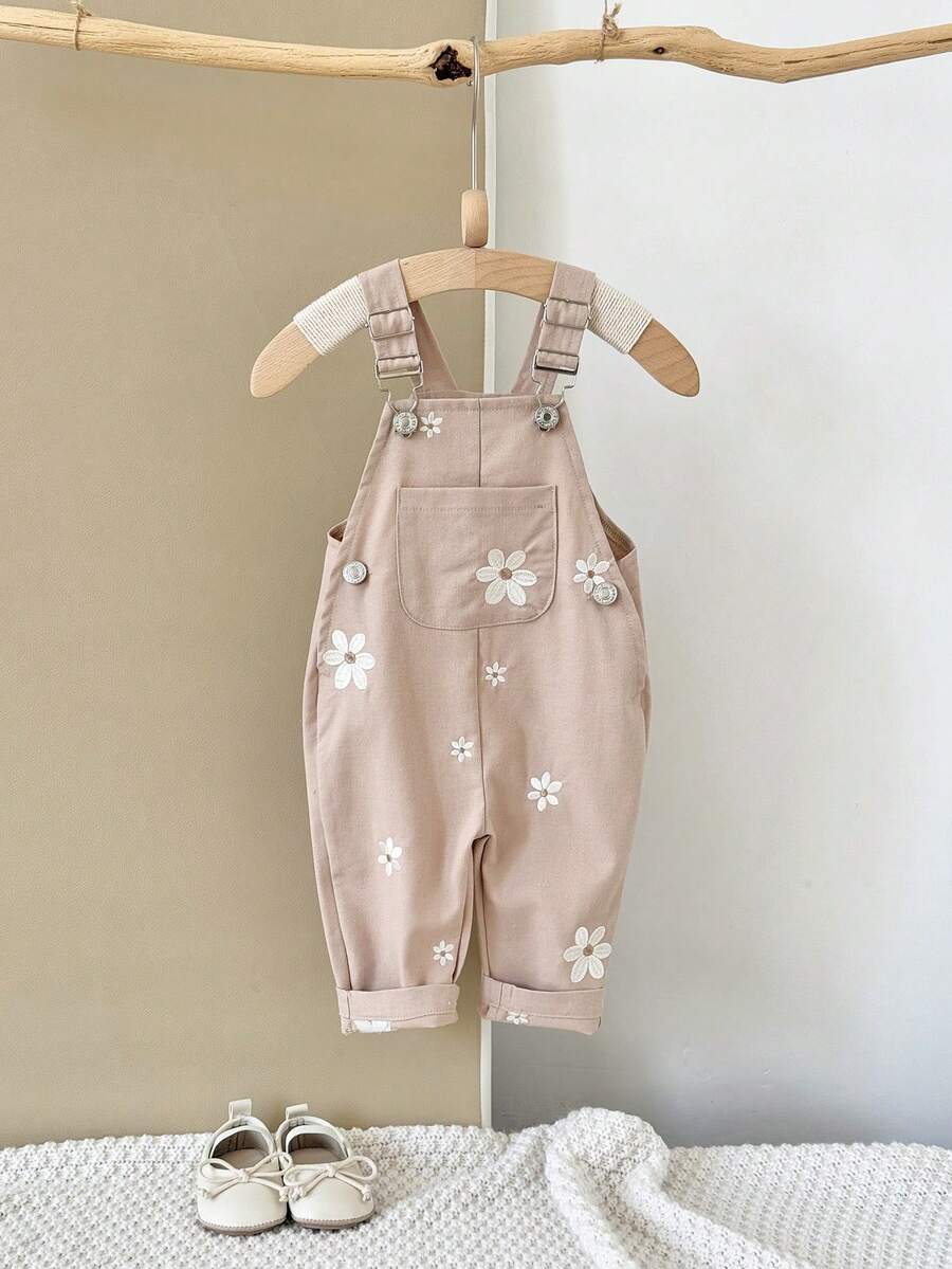Ležerne svetloplave pantalone za bebe devojčice sa vezom sitnih cvetova