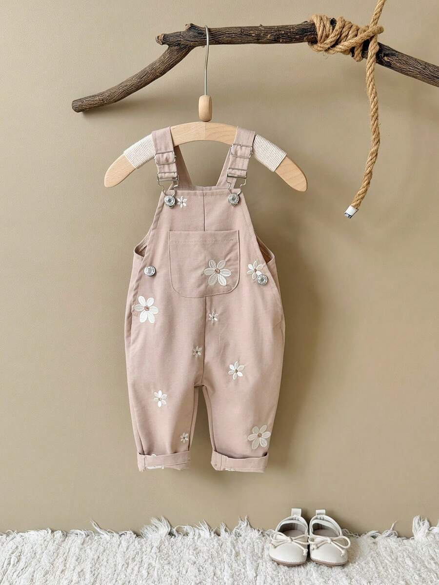 Ležerne svetloplave pantalone za bebe devojčice sa vezom sitnih cvetova