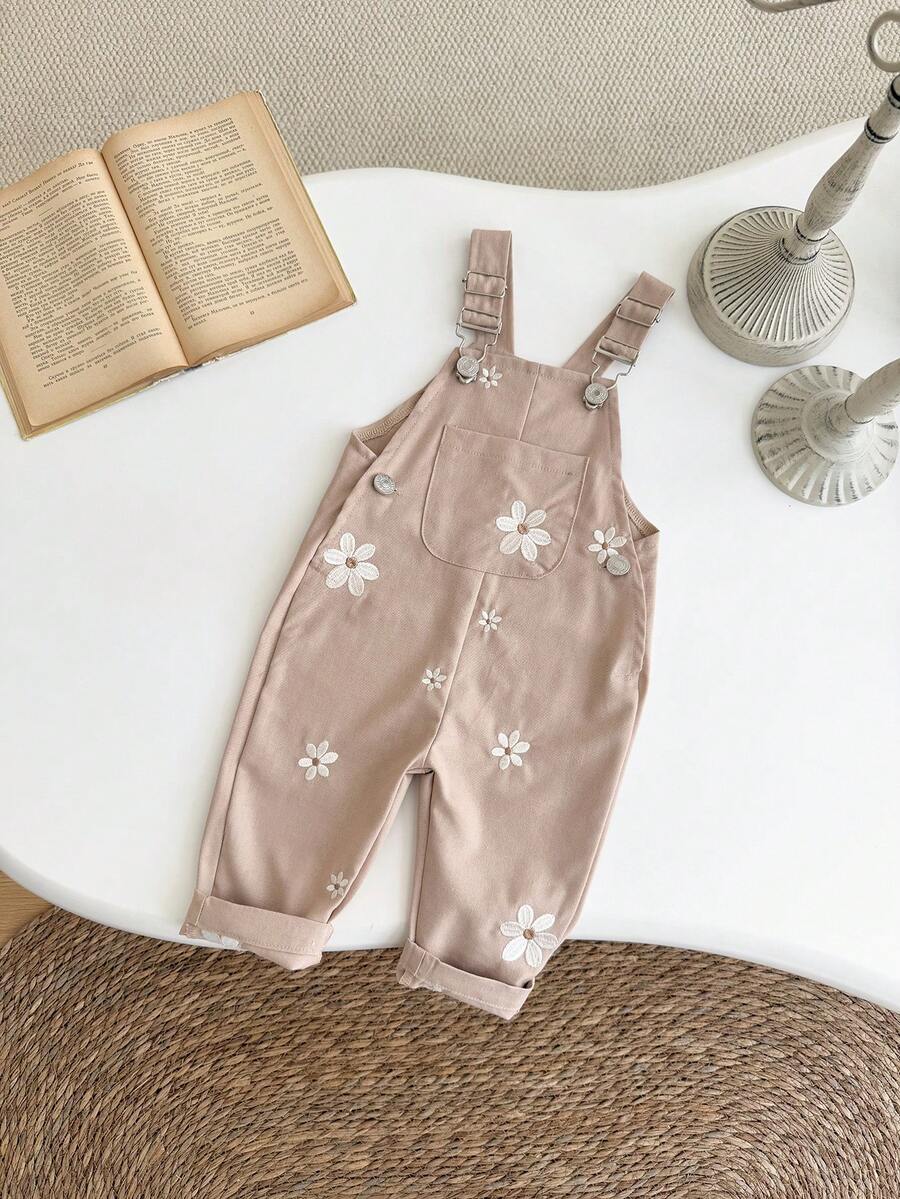 Ležerne svetloplave pantalone za bebe devojčice sa vezom sitnih cvetova