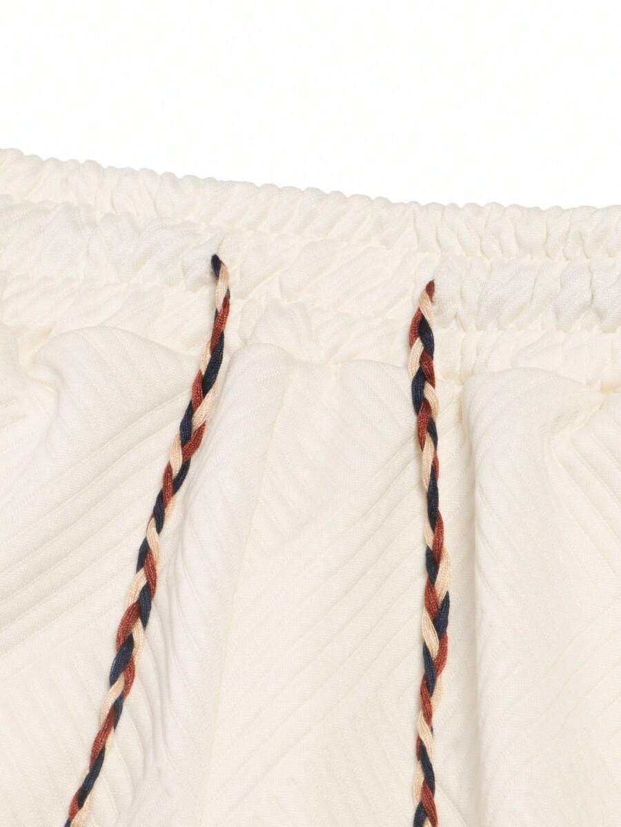Muške letnje ležerne kratke pantalone sa teksturiranim materijalom i pertlom u struku