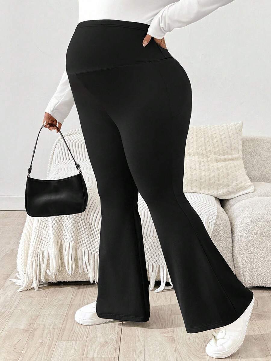 Trudničke raširene pantalone plus size jednobojne sa podesivim strukom i džepovima