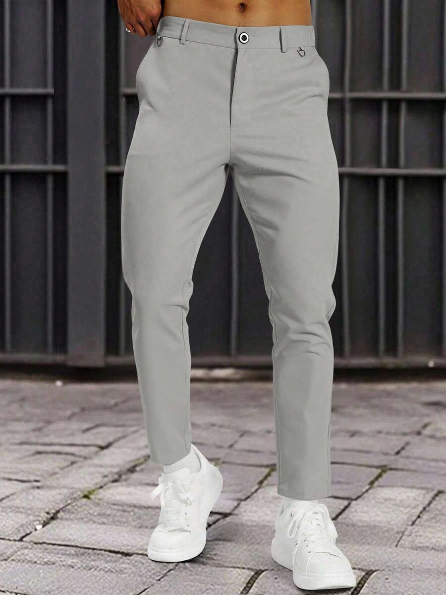 Muške formalne pantalone jednobojne sa kosim džepovima, bez kaiša