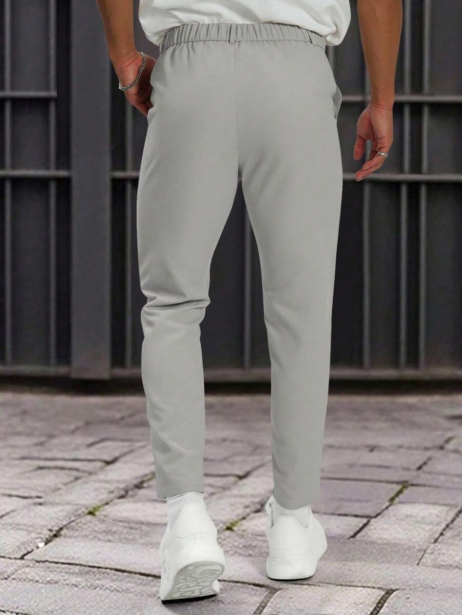 Muške formalne pantalone jednobojne sa kosim džepovima, bez kaiša