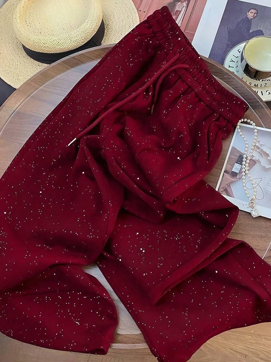 Ležerne široke pantalone ravnih nogavica sa elastičnim strukom, dezen zvezdanog neba