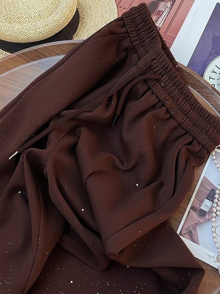 Ležerne široke pantalone ravnih nogavica sa elastičnim strukom, dezen zvezdanog neba