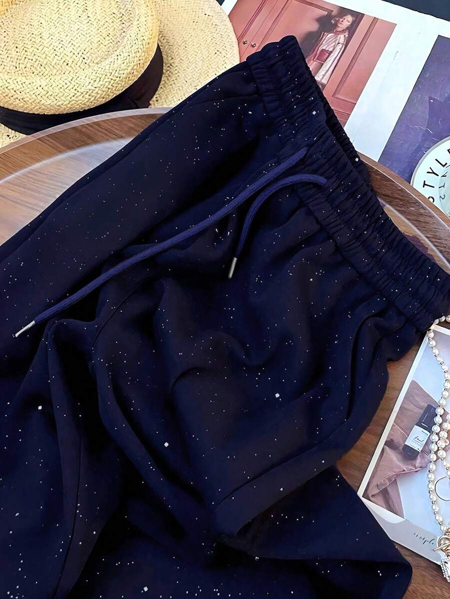 Ležerne široke pantalone ravnih nogavica sa elastičnim strukom, dezen zvezdanog neba