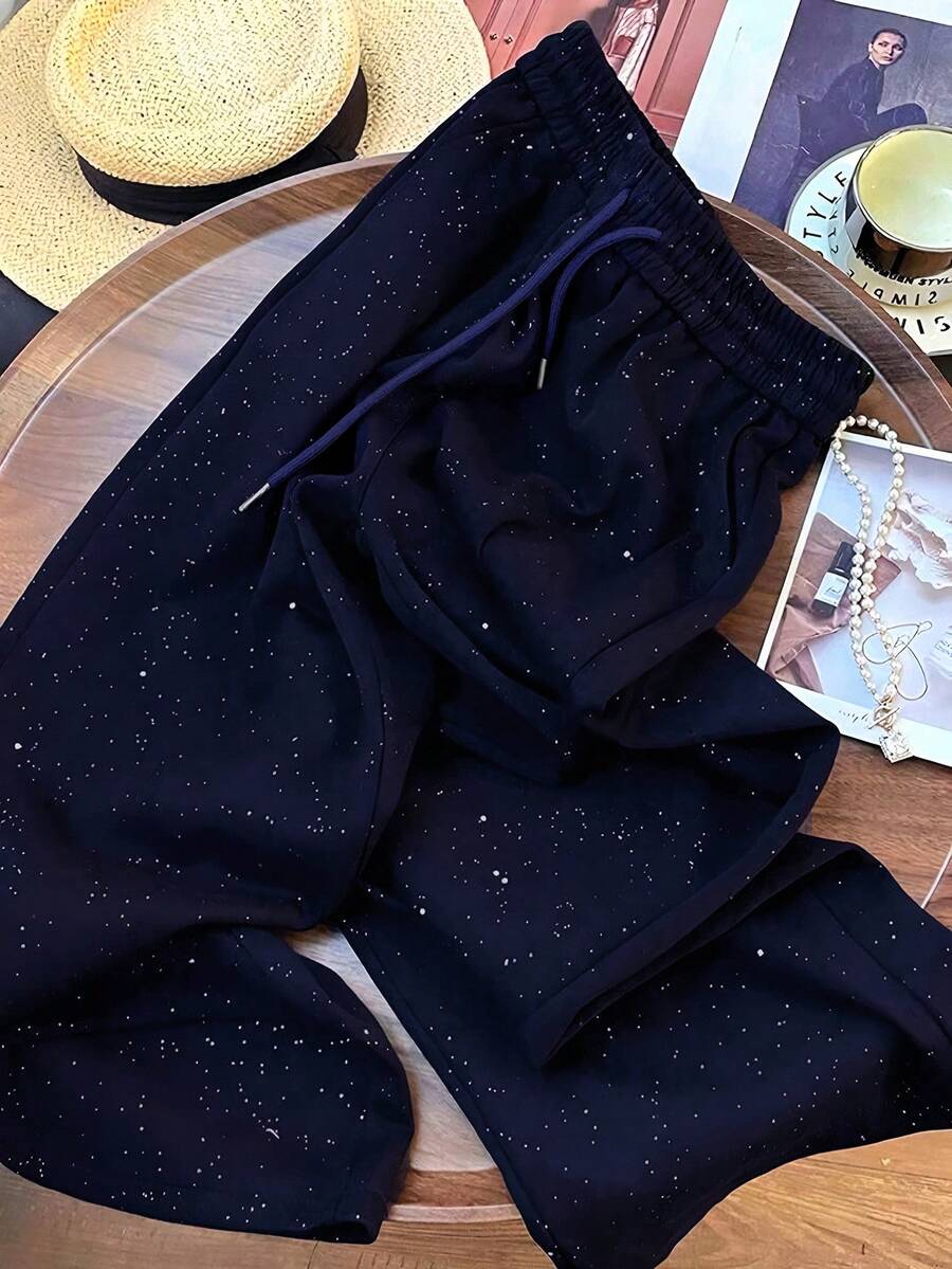 Ležerne široke pantalone ravnih nogavica sa elastičnim strukom, dezen zvezdanog neba