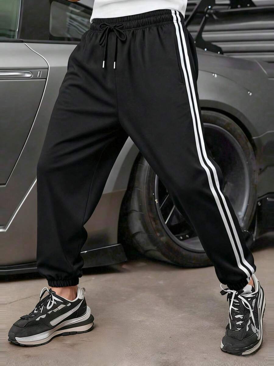 Letnje lagane prugaste joger pantalone, muške široke svestrane