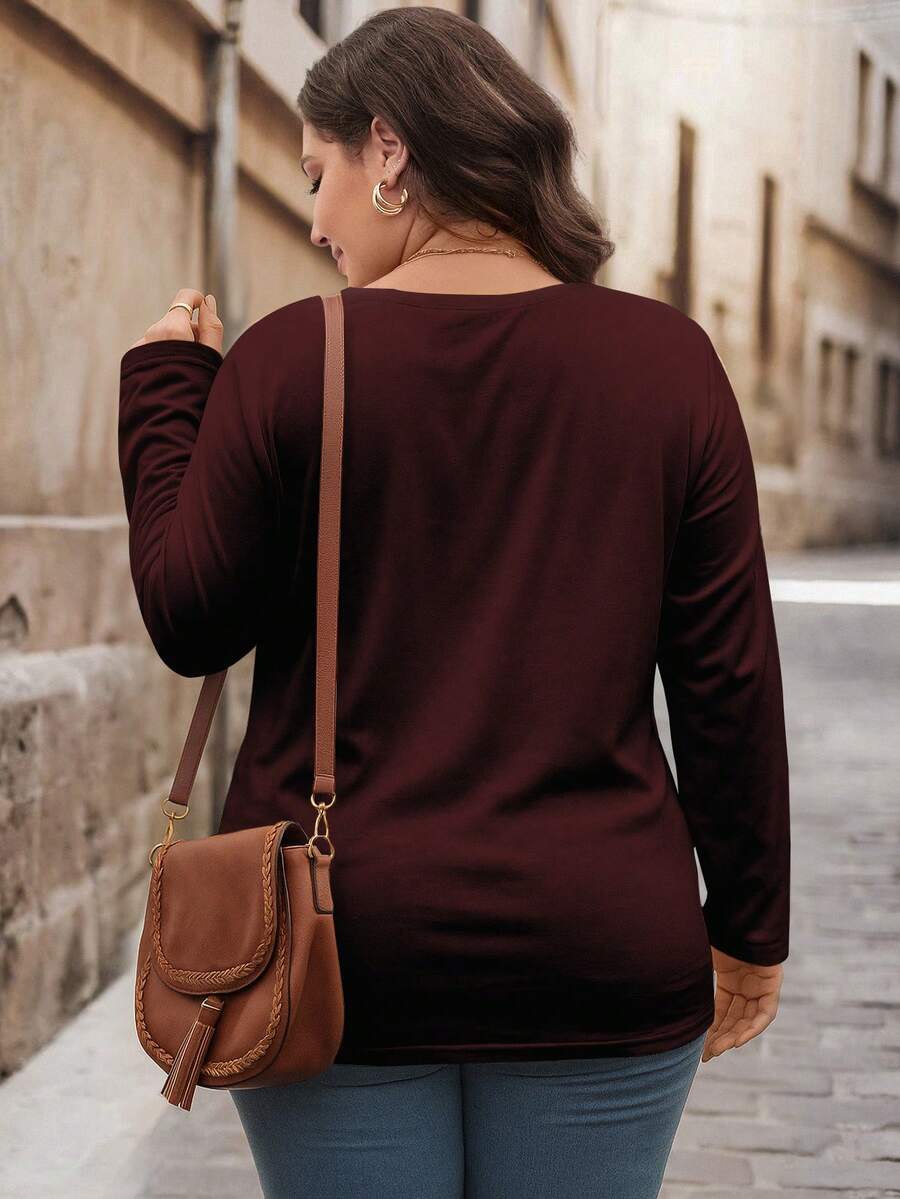 Bluza plus size, širokog kroja, sa polu-ziperom, okruglim izrezom i dugim rukavima