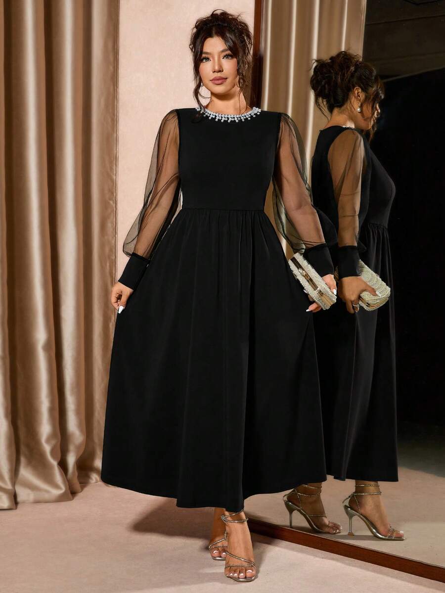 Elegantna ženska haljina A-kroja plus size sa perlama i mrežicom