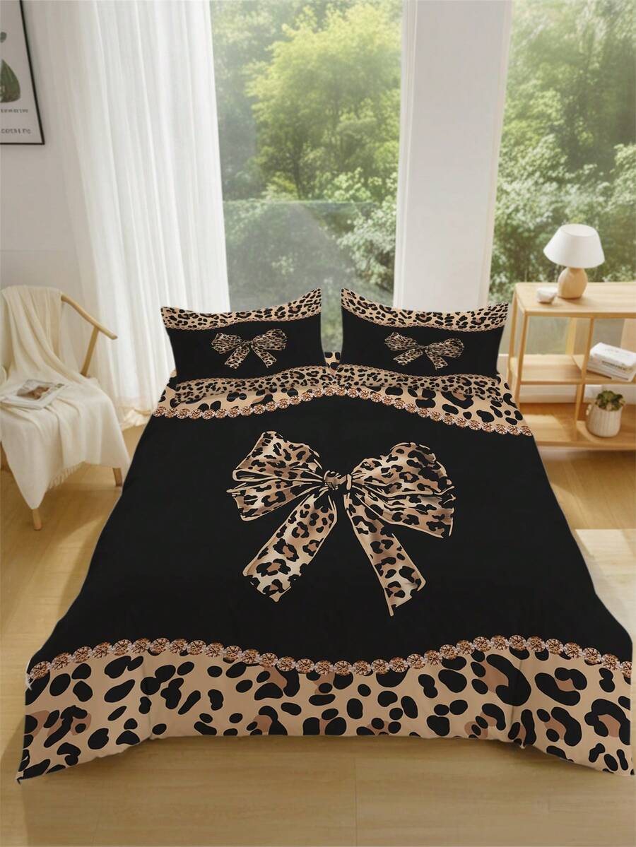 Set posteljine sa leopard printom i mašnom, 3 komada (1 navlaka za jorgan + 2 jastučnice, jorgan nije uključen)