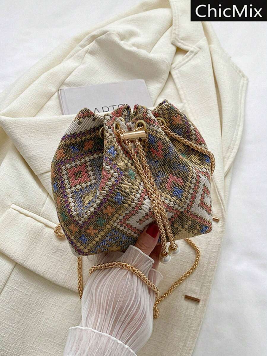 Moderna mini torba  jednobojna sa lanac kaišem