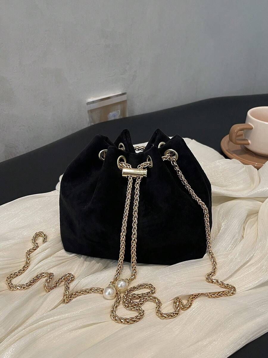 Moderna mini torba  jednobojna sa lanac kaišem