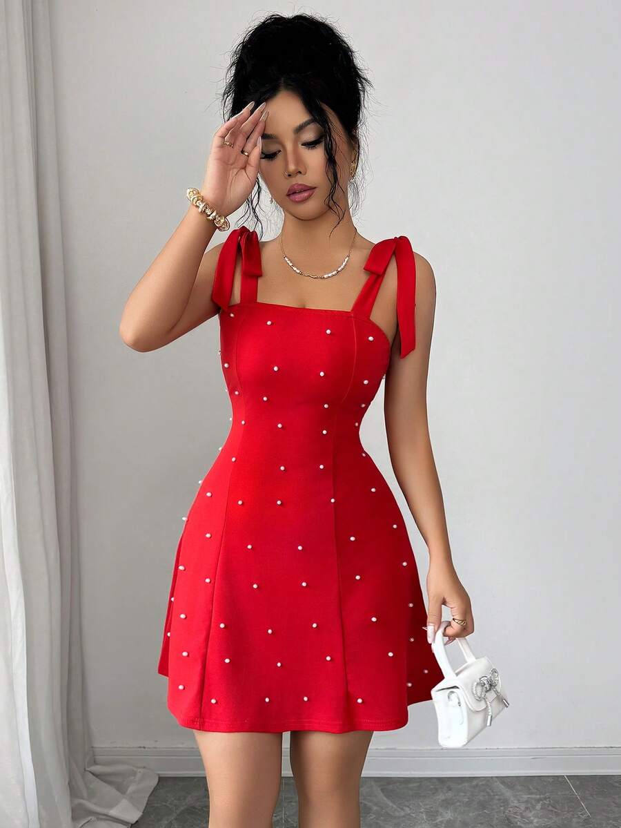 Ženska Elegantna Mini Haljina sa Perlama i Mašnom u Jednobojnoj Boji